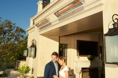2 C series Infratech above a smiling couple outdoors