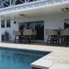 WD Series Infratech heaters above poolside tables