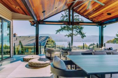 Slimline Infratech Outdoor heater on a patio on the water